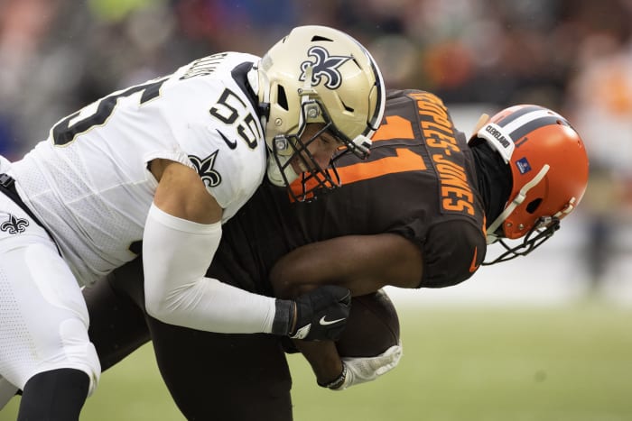 New Orleans Saints linebacker Kaden Elliss (55) holds Cleveland Browns receiver Donovan Peoples-Jones (11) to a short reception. Mandatory Credit: Scott Galvin-USA TODAY Sports